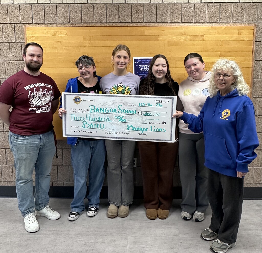 Bangor Lions presenting check for Band to director and students