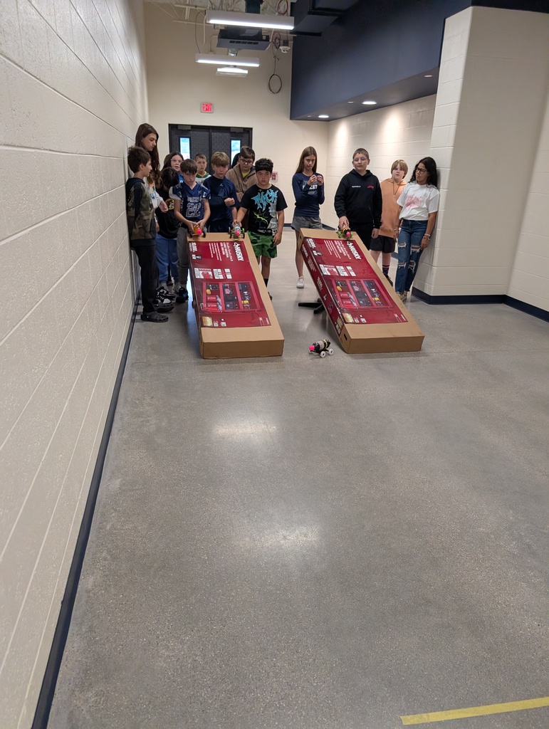 students racing 3D cars