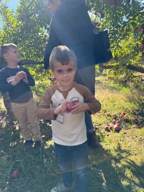 kid with an apple