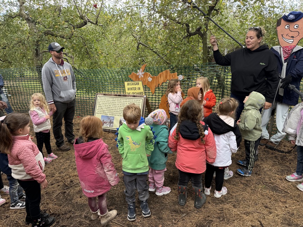group of kids learning on a field trip