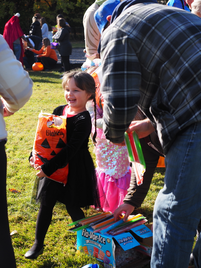 kid with bag full of candy