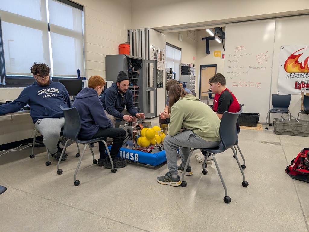robotics students working together