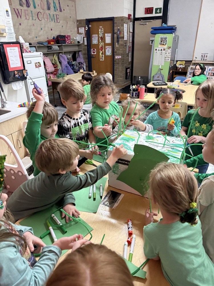 The preschoolers hard at work on their Leprechaun ☘️ Trap.