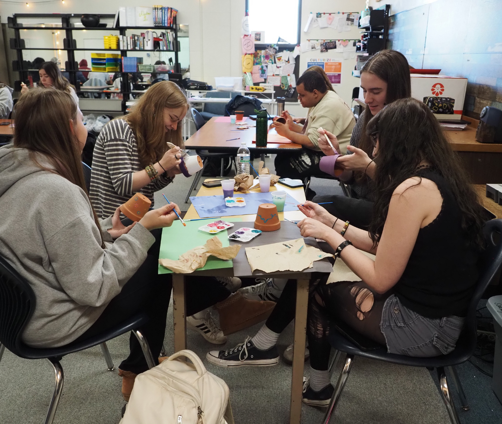students painting