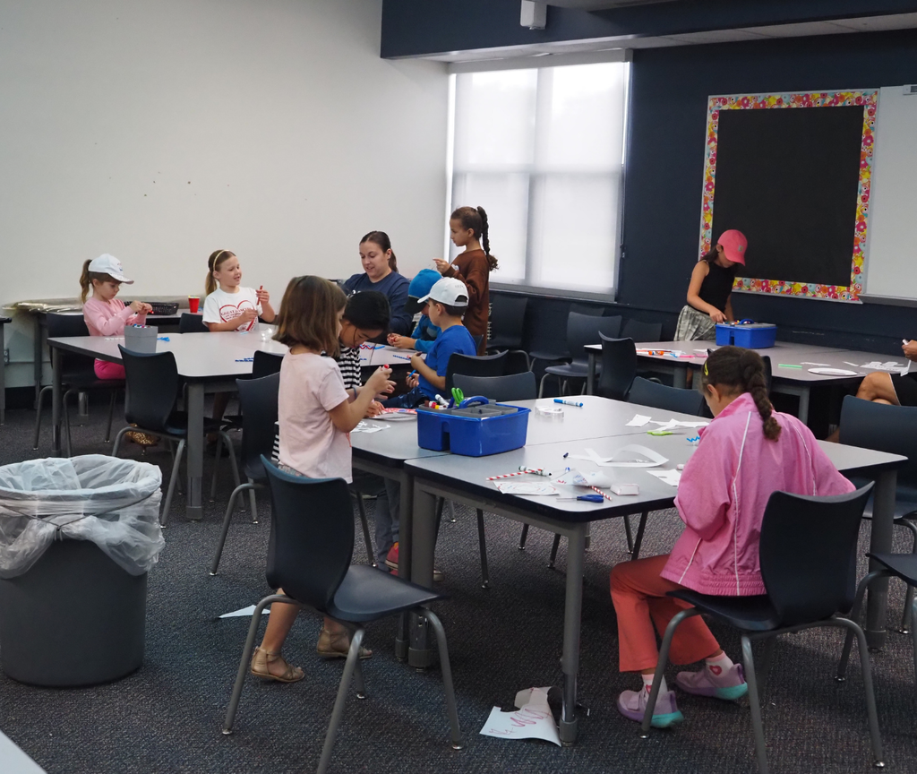 group of kids doing crafts