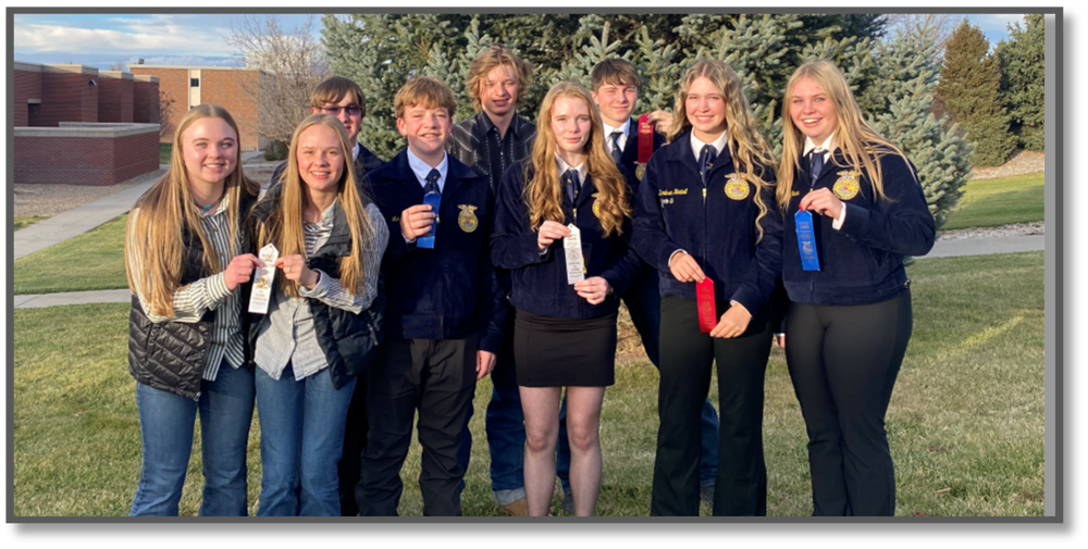 Students holding awards