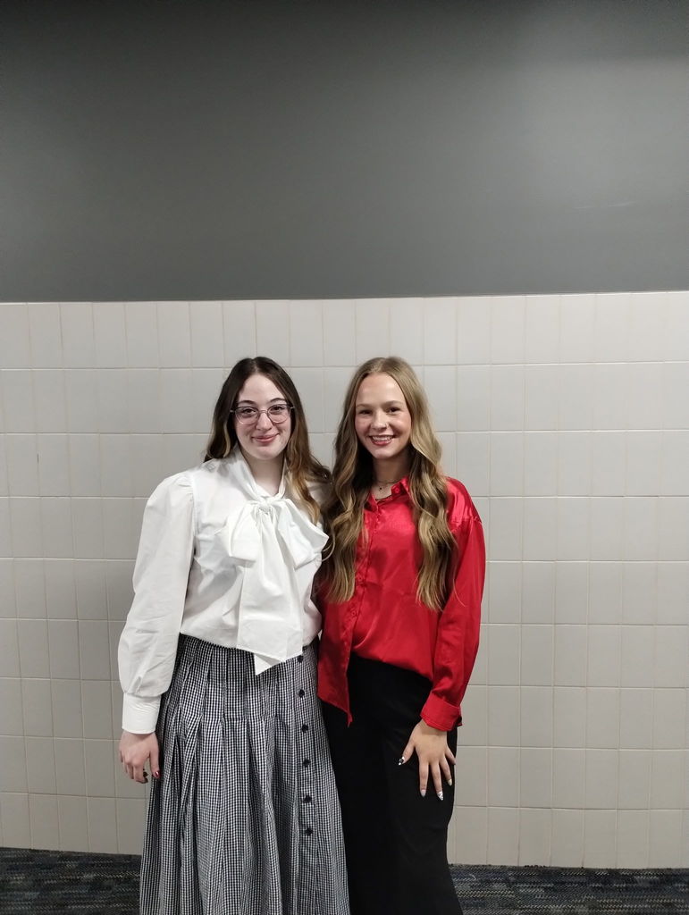 Two girls competing in a Speech Meet