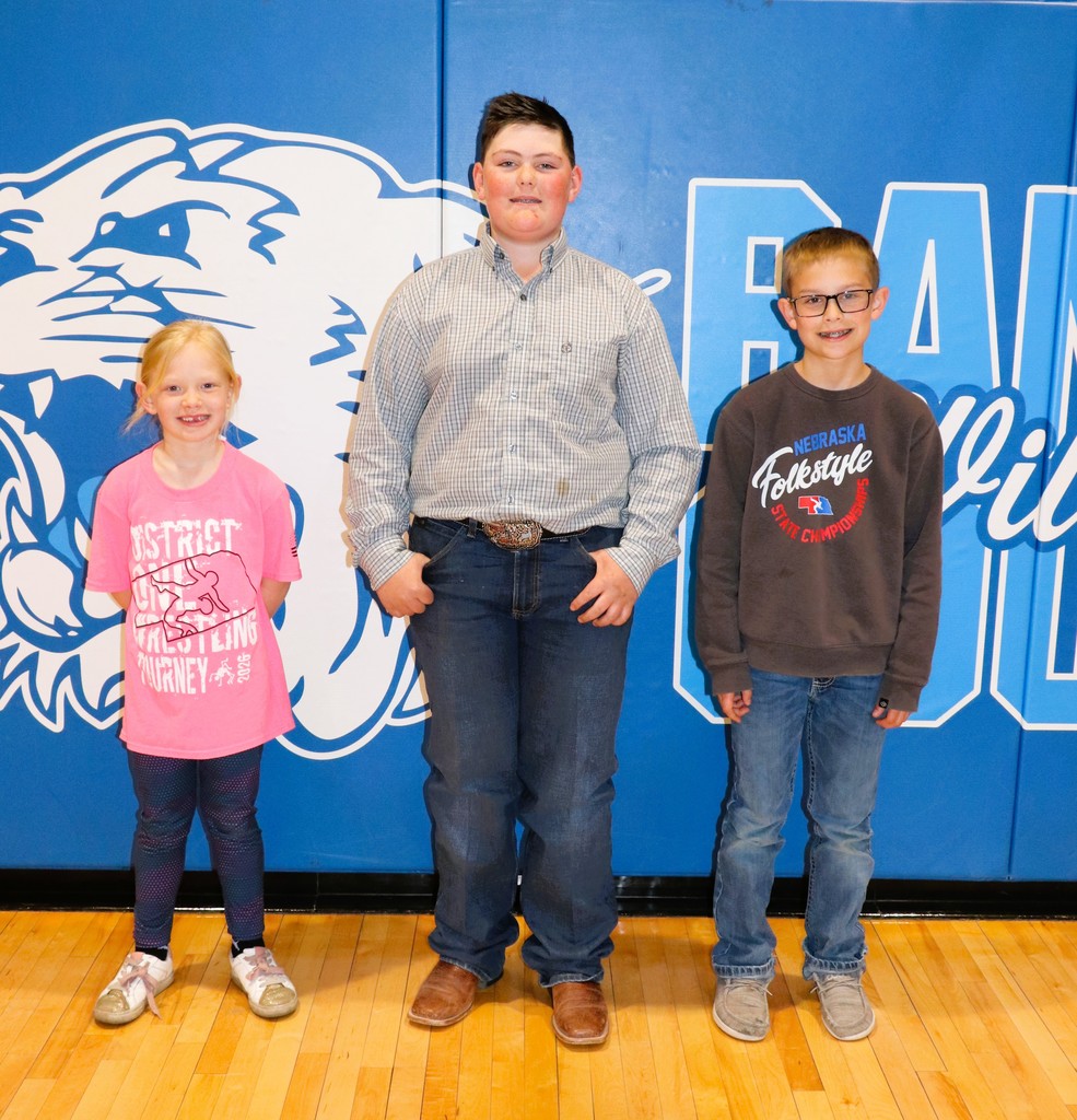 Students standing because they were recognized as student of the month 