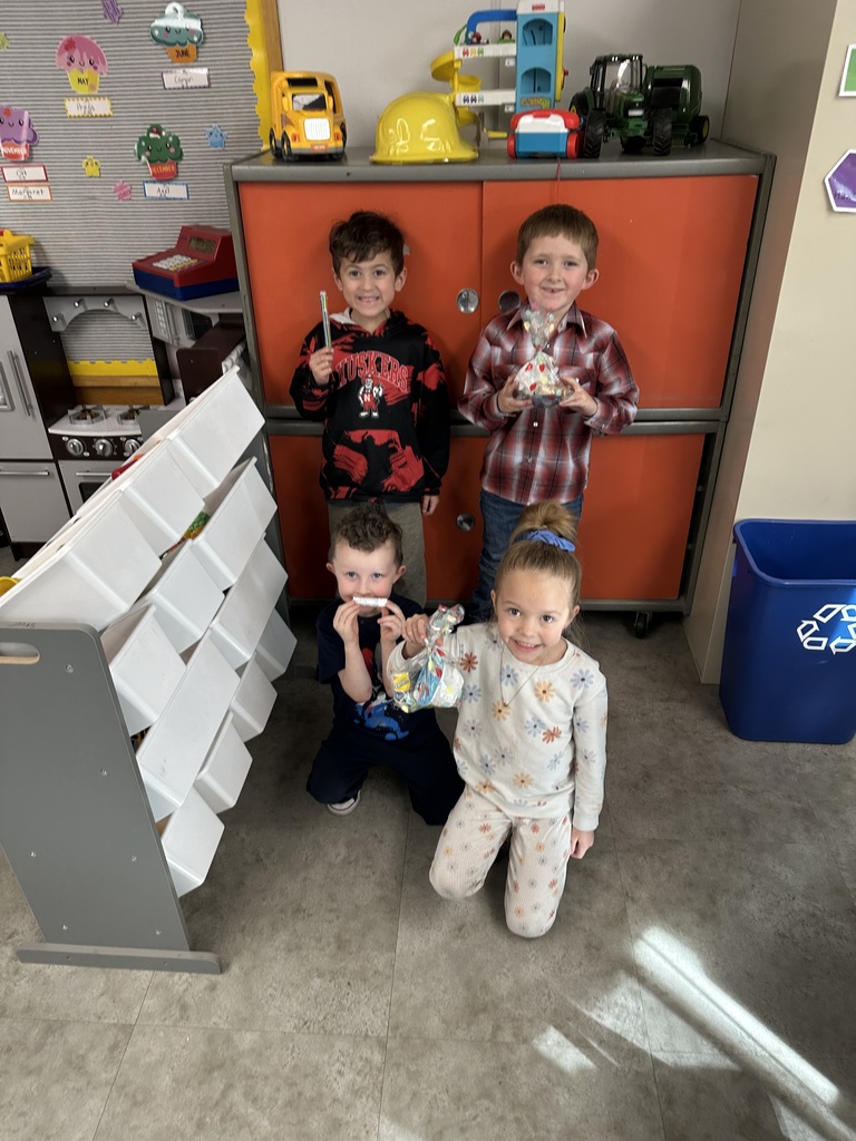 Student holding a prize for reading