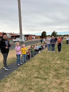 Group of students eating popsicles 