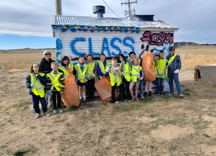 Group of Students cleaning up trash