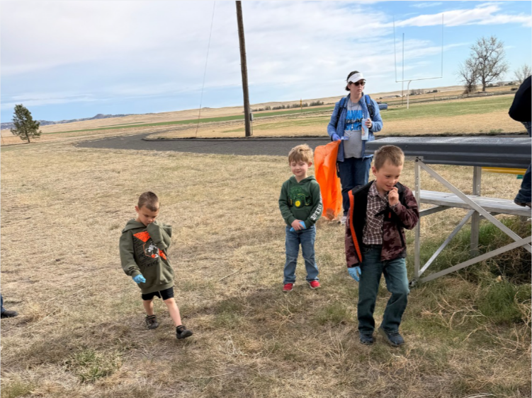 Group of Students picking up trash