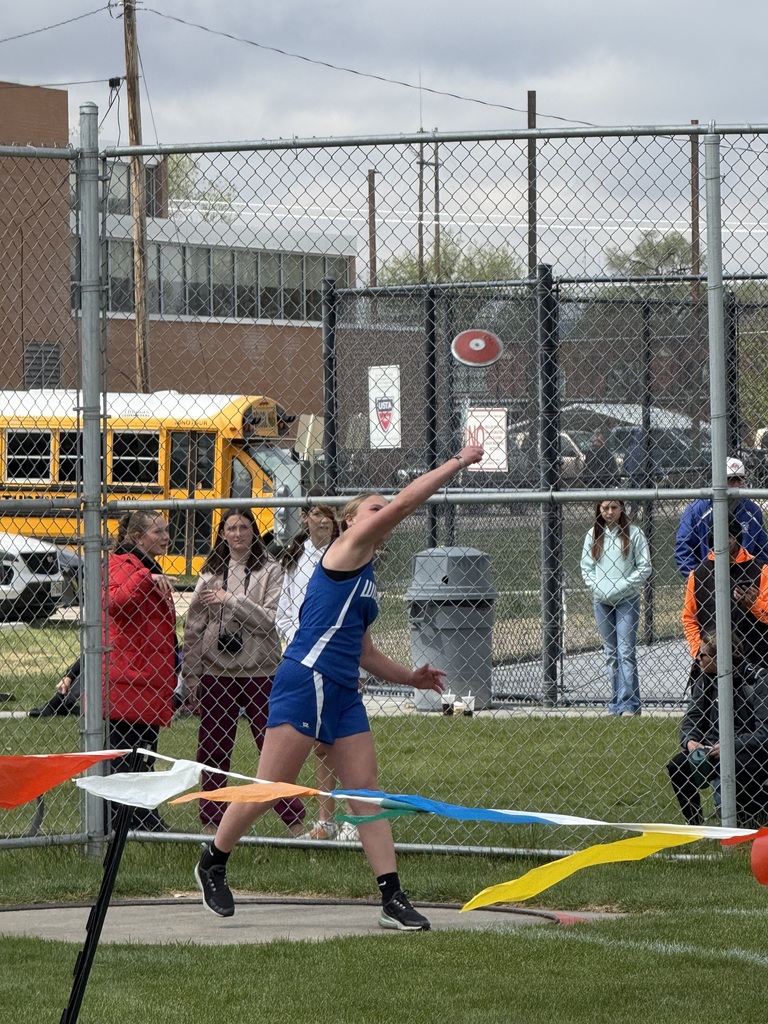 Student throwing discus 