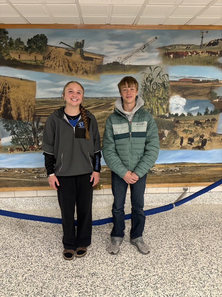 Two students standing 
