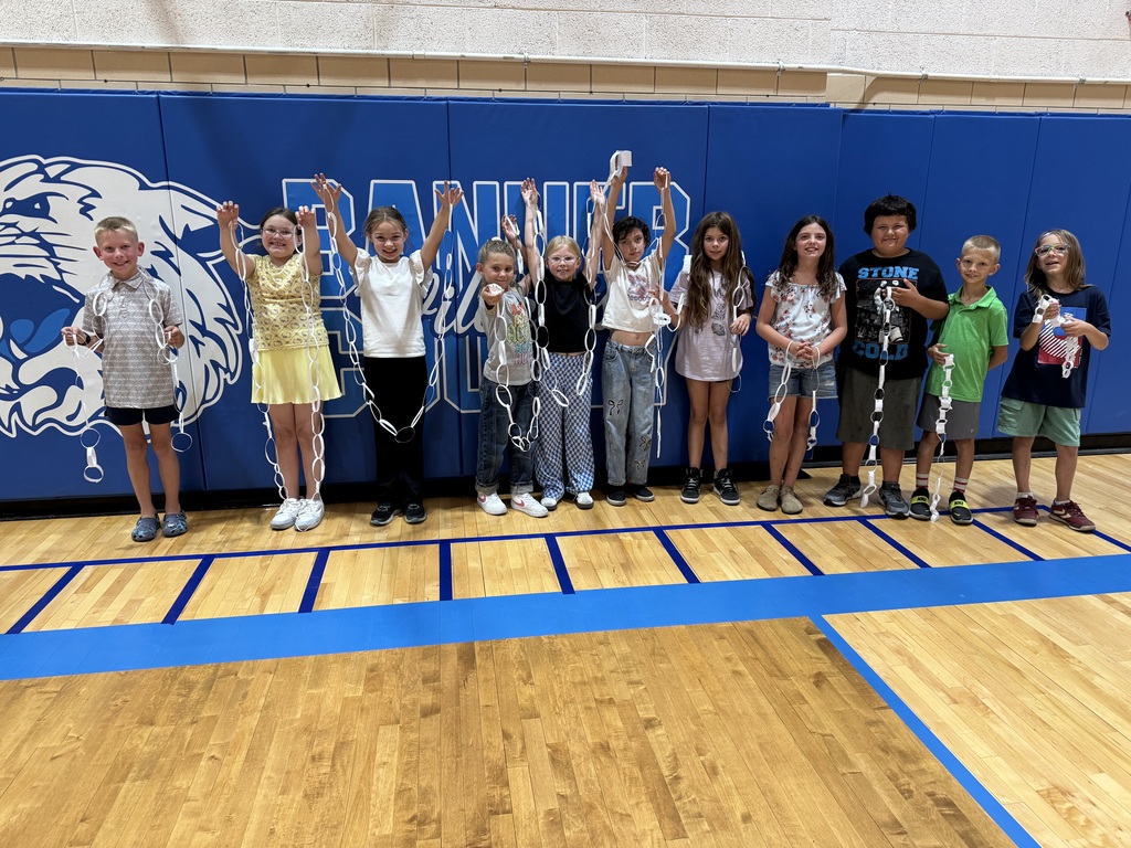 Students building a paper chain