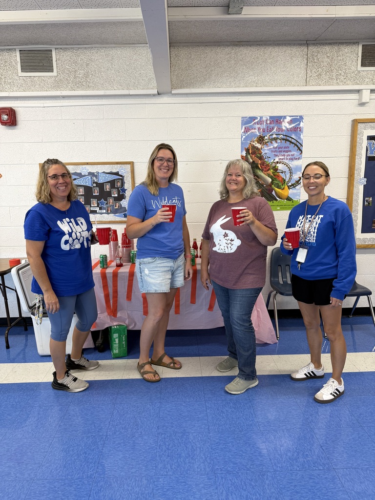 Four teachers holding a Shirly temple drink