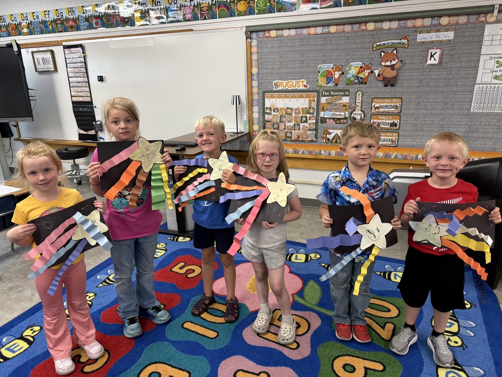 Students holding star projects