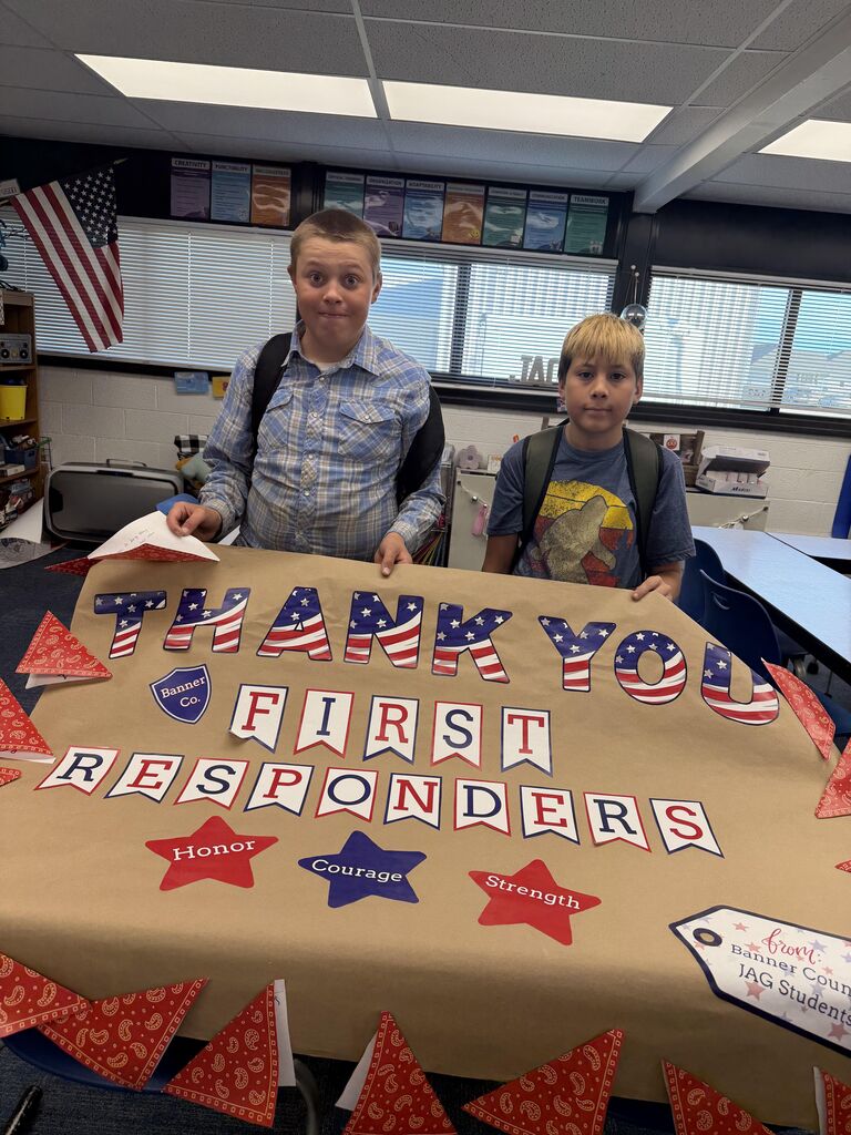 Students holding a banner