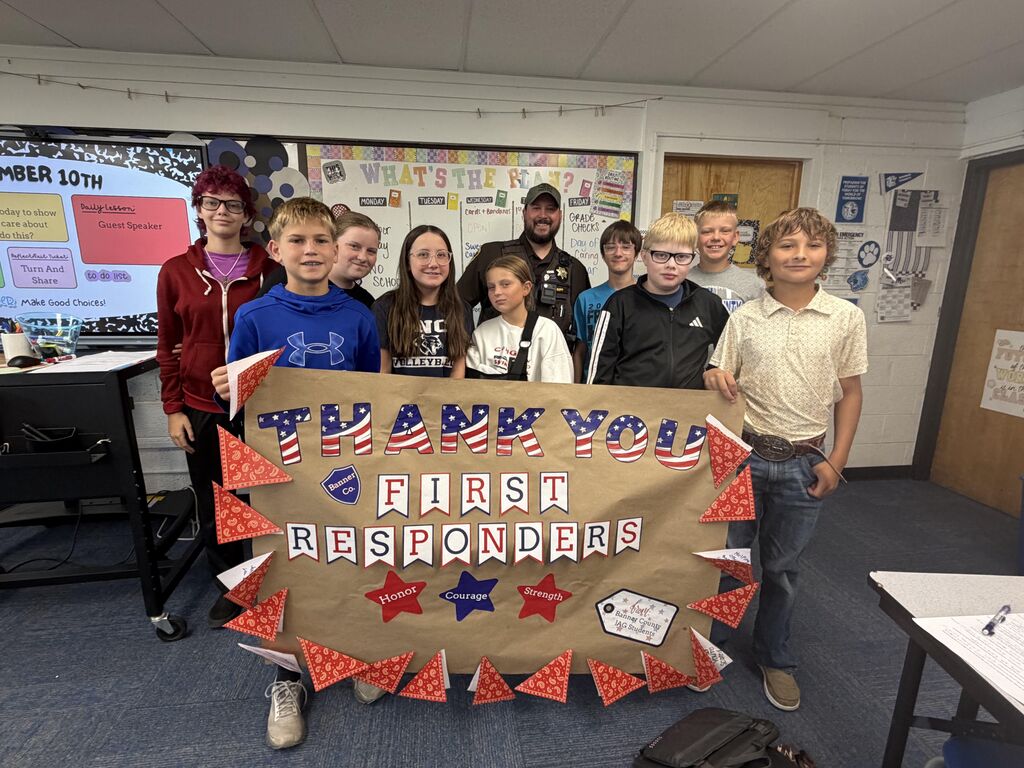 Students holding a banner