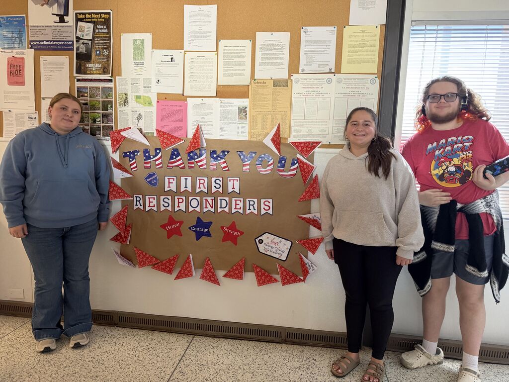 Students holding a banner