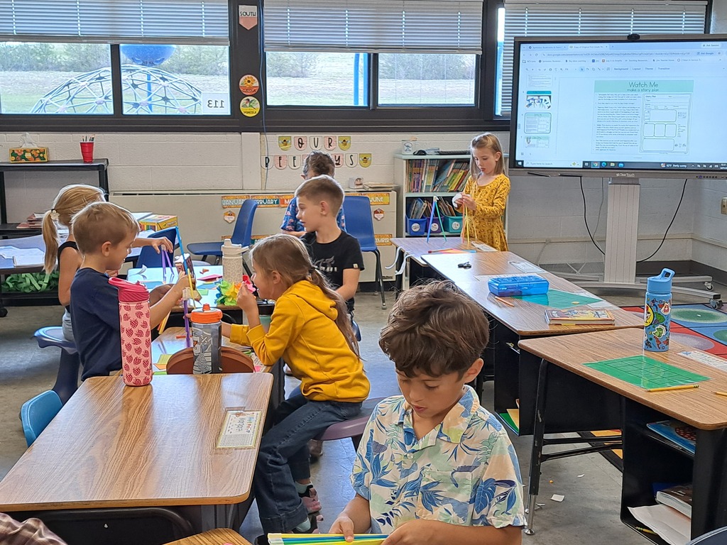 Students building a bridge