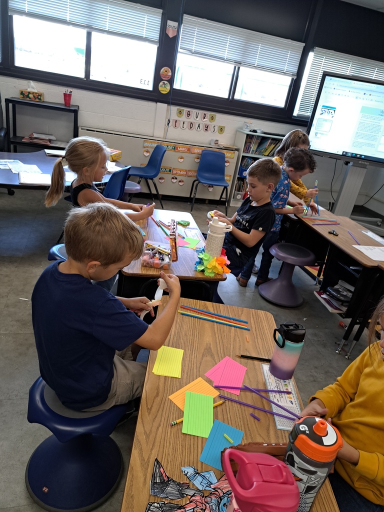 Students building a bridge