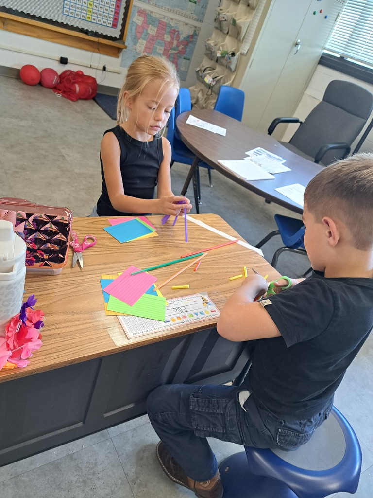 Students building a bridge