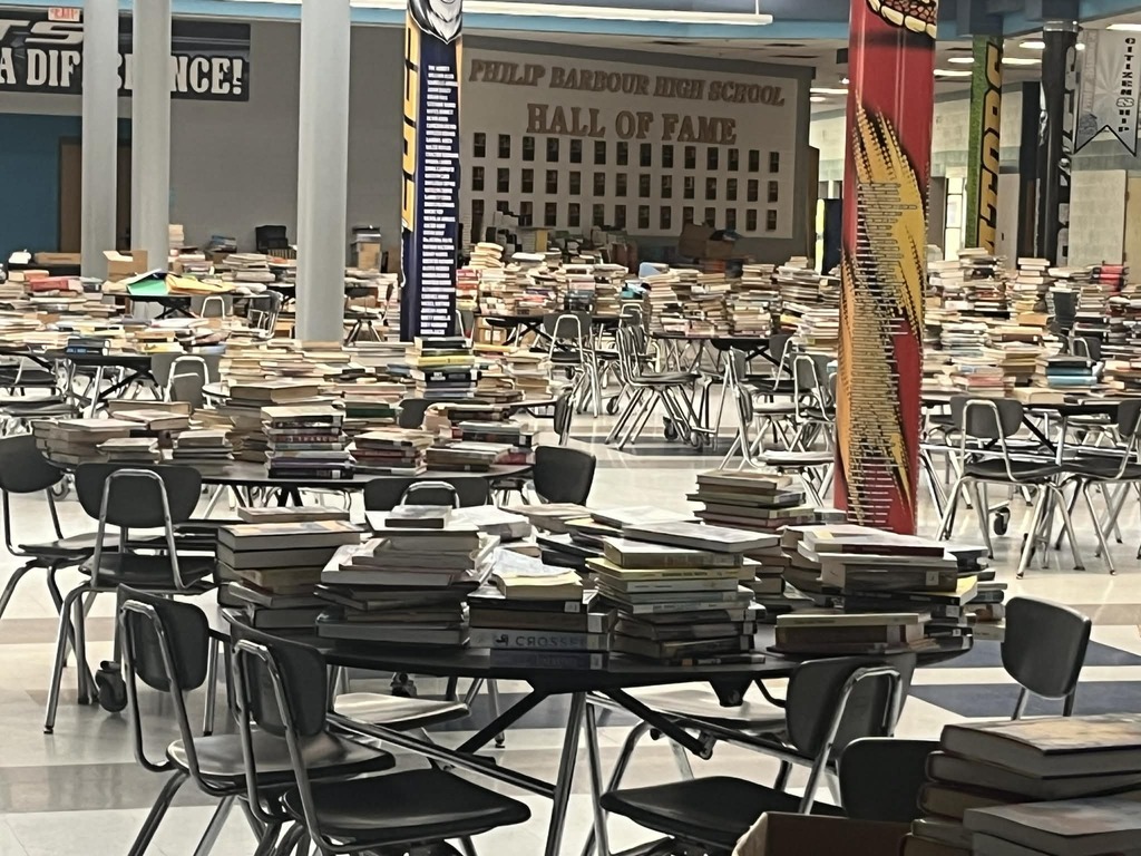 Tables with books.