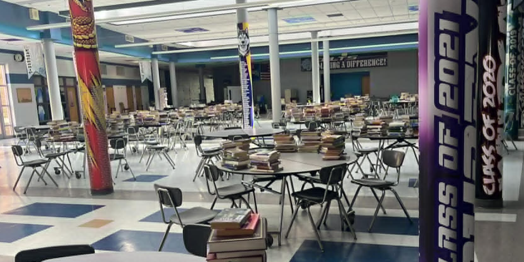 Tables with books.