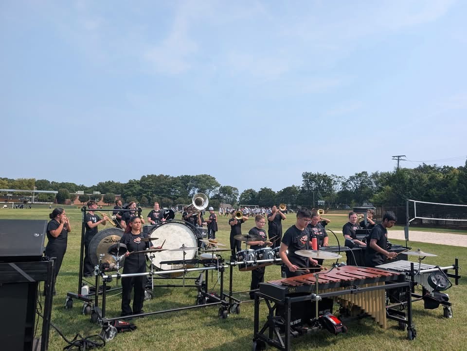 Image of the band playing during the performance. 