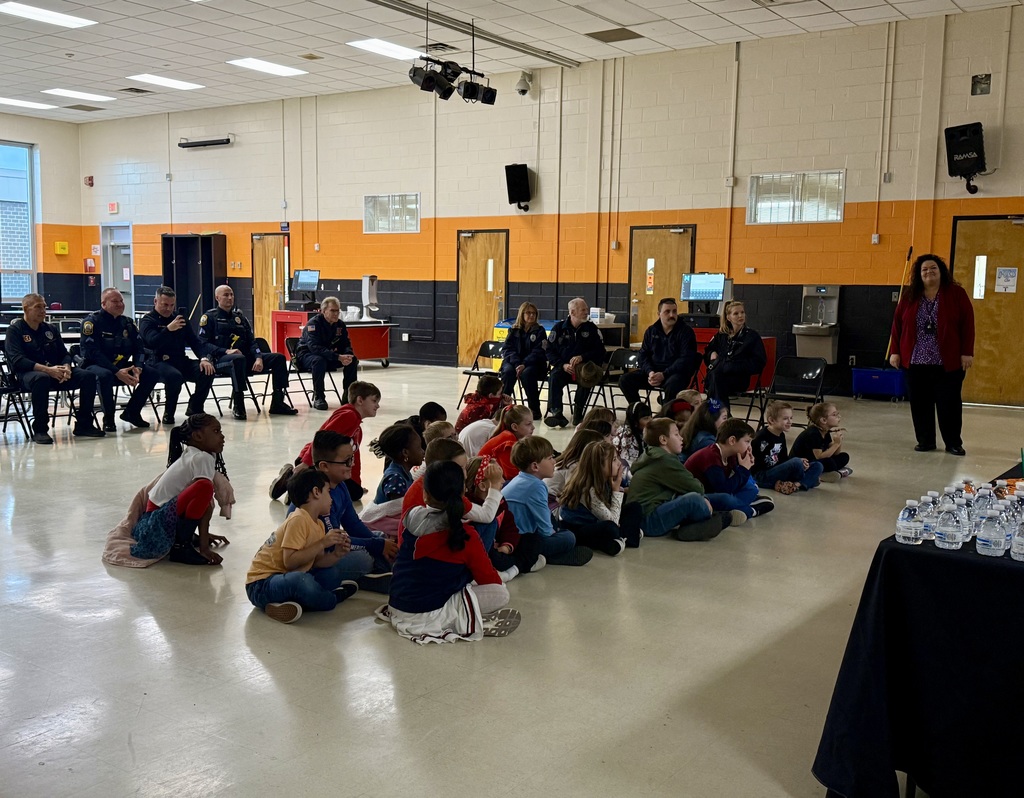 Image of the first responders and students watching the video presentation that was shown.