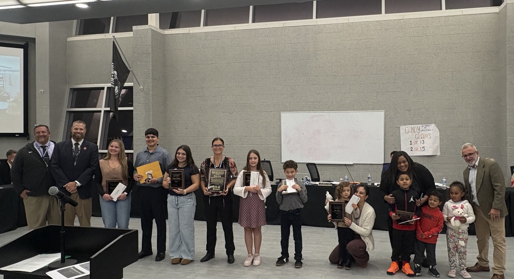 Image of the UPstander awards and those recognized posing with the BHS Principal, Superintendent, BOE President. 