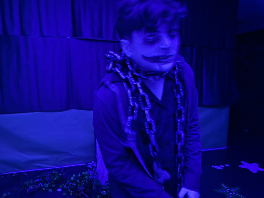 Image of a male student dressed up for the spooky hallway tour. 