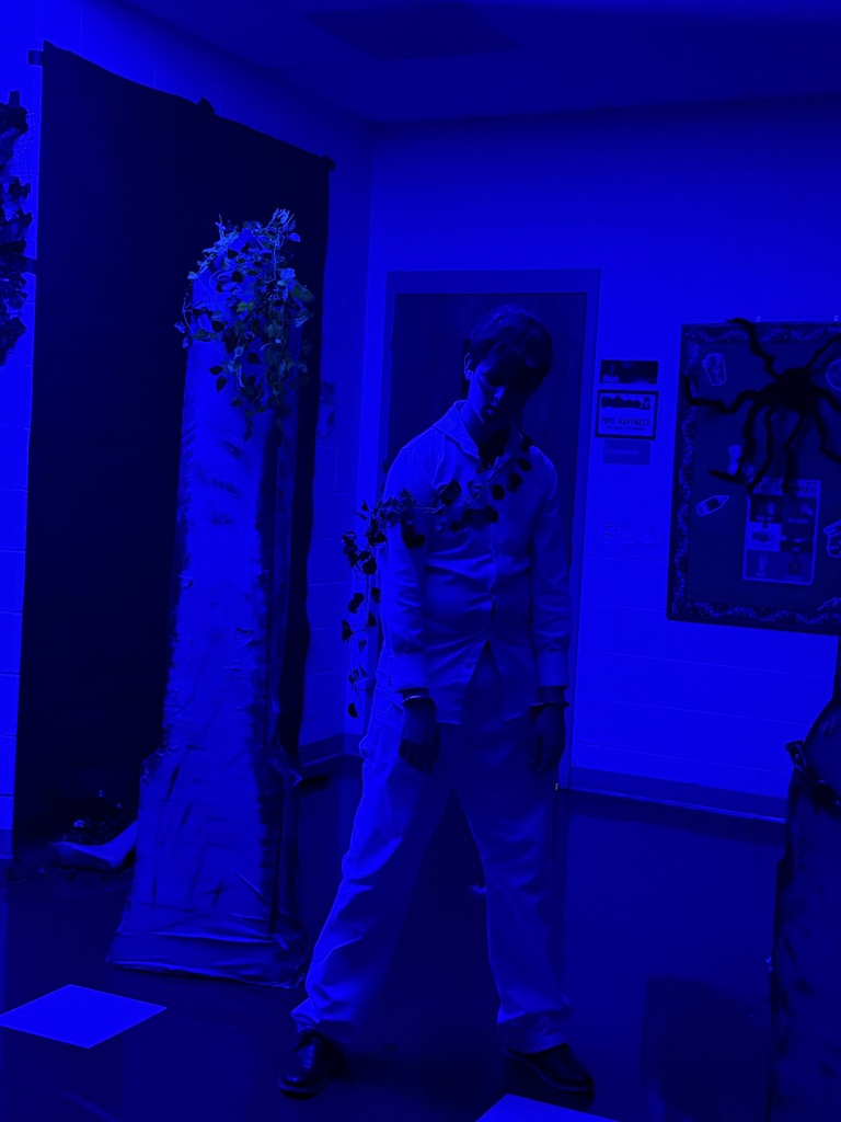 Image of a male student dressed up for the spooky hallway tour. 
