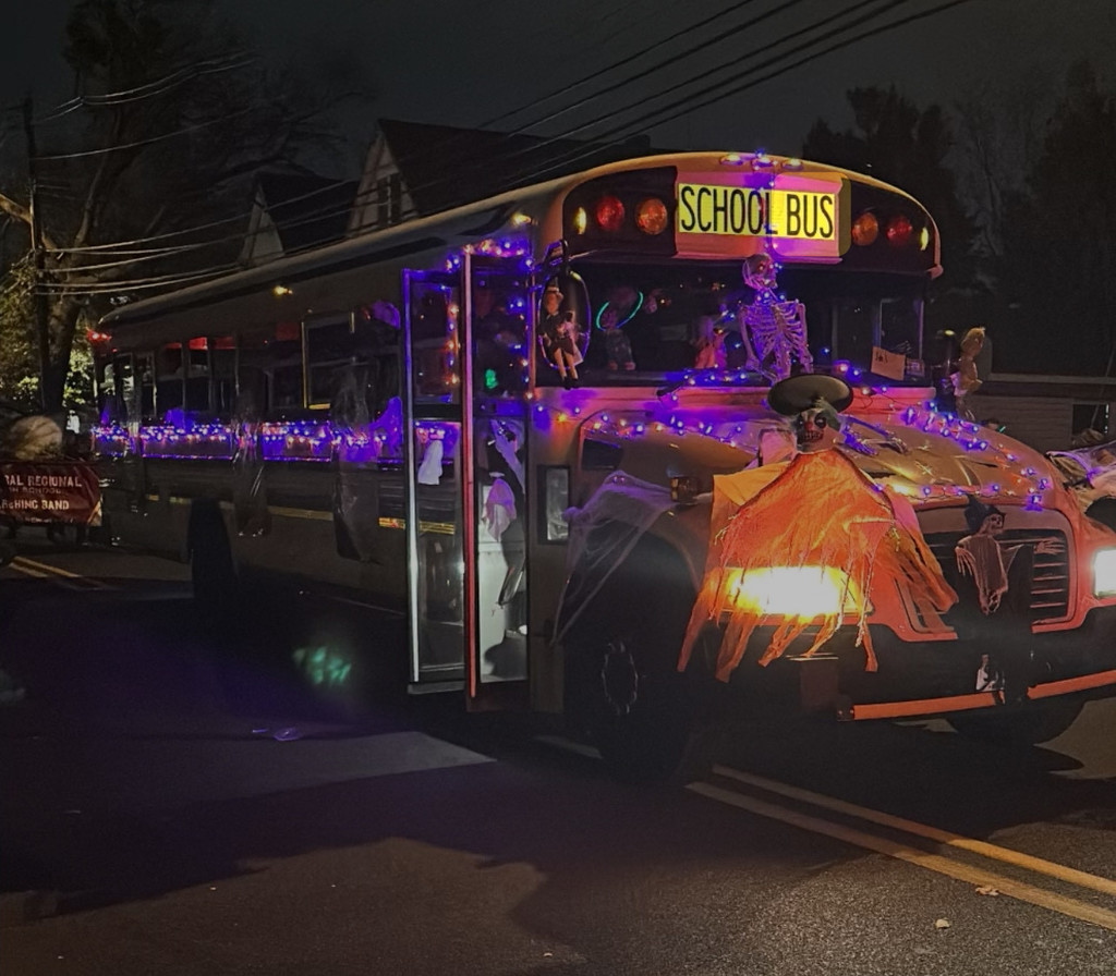 Bus decorated for Halloween with lights and decorations. 