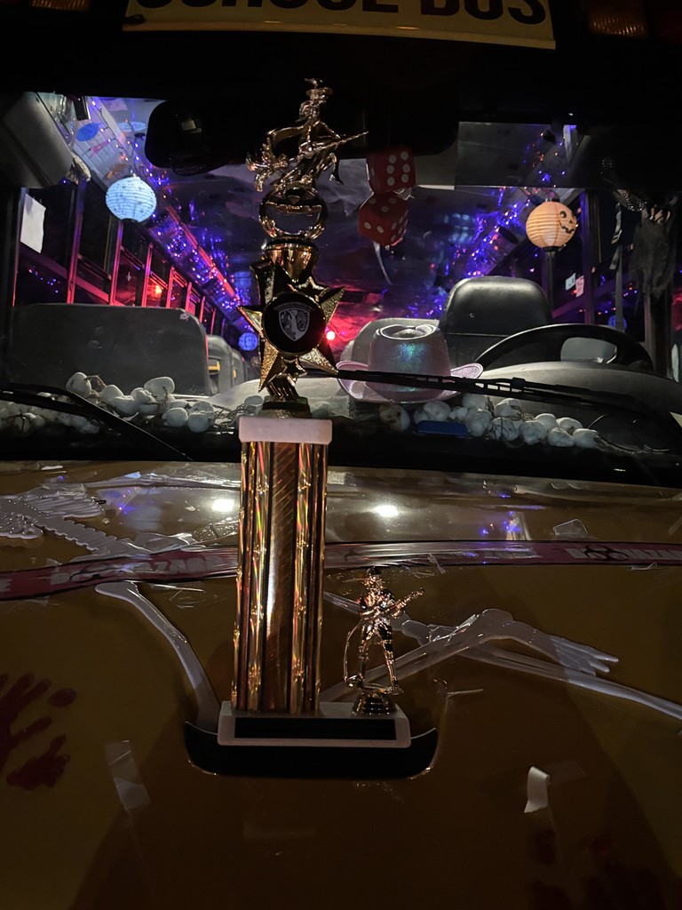 2nd place trophy on the hood of the bus. 