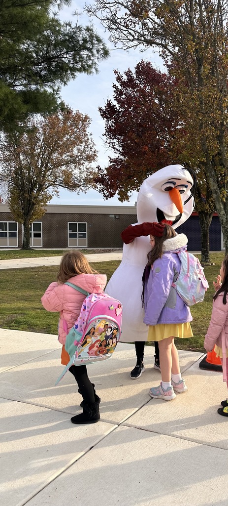 Image of Olaf interacting with students during dismissal.
