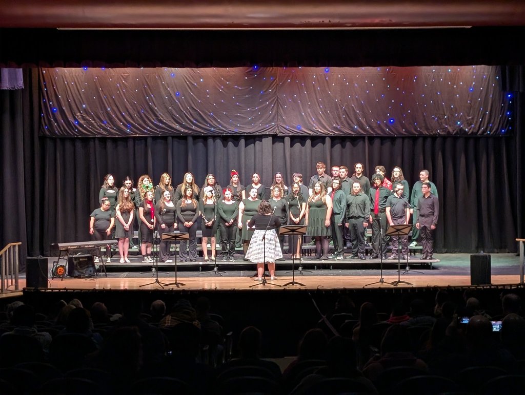 Image of the BHS chorus performing on stage. 
