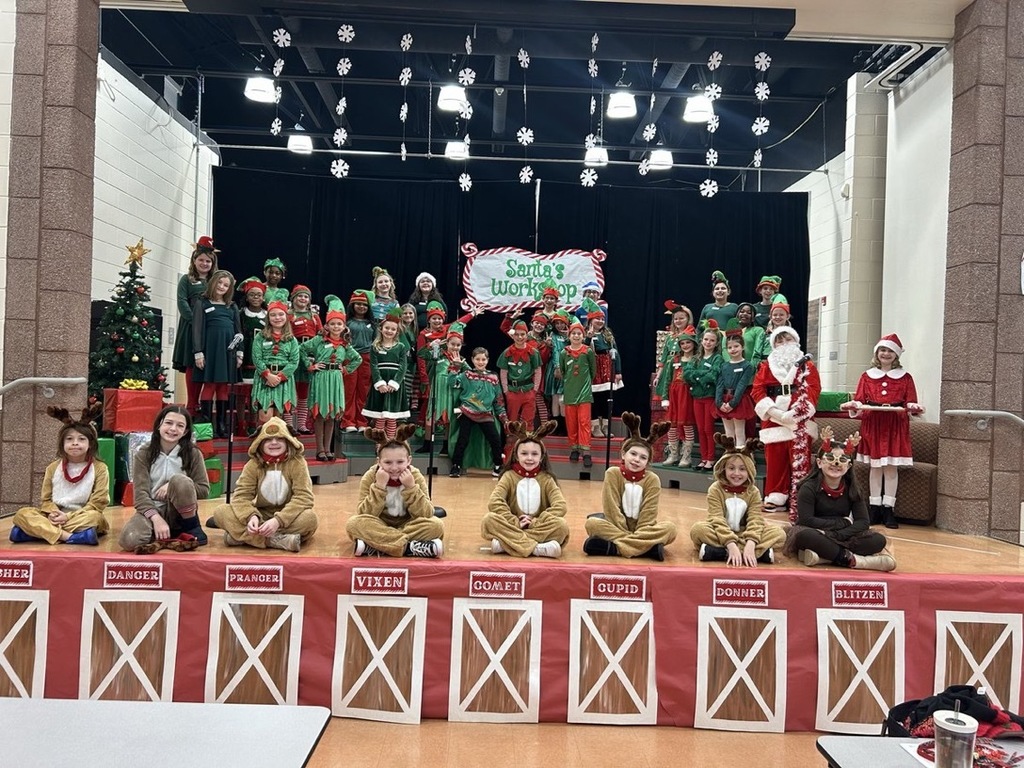 Image of a scene in the play with the students posing. 