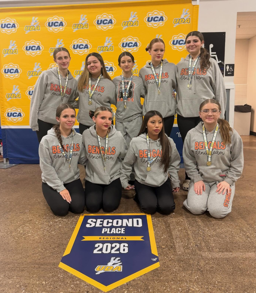 Image of the BHS Dance Team posing with their 2nd place banner. 