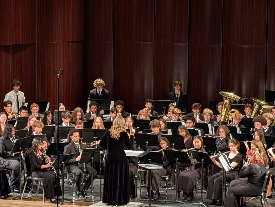 Image of the Symphonic Band playing on stage.