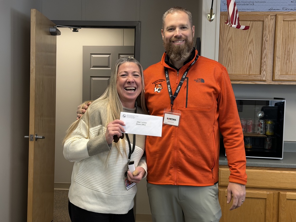 Image of Jillian posing with the Superintendent.