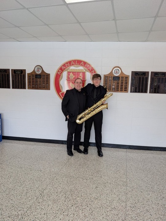 Image of Liam and Mr. McGrath posing together.