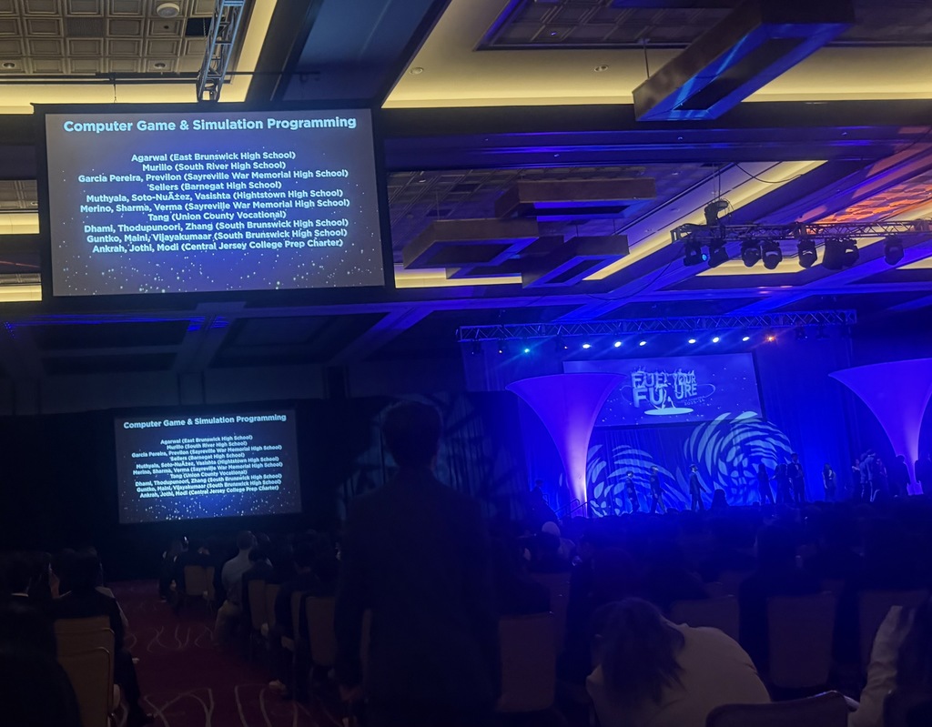 Image of the screen projecting the Computer Game & Simulation Programming winners. 