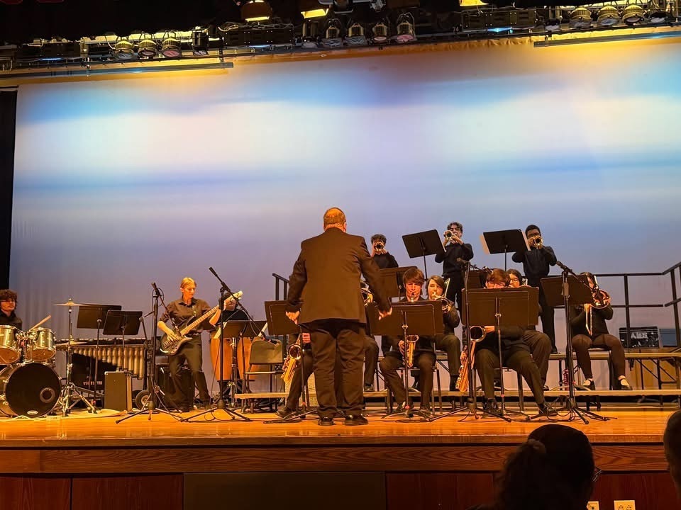 Image of the BHS jazz band performing on stage. 