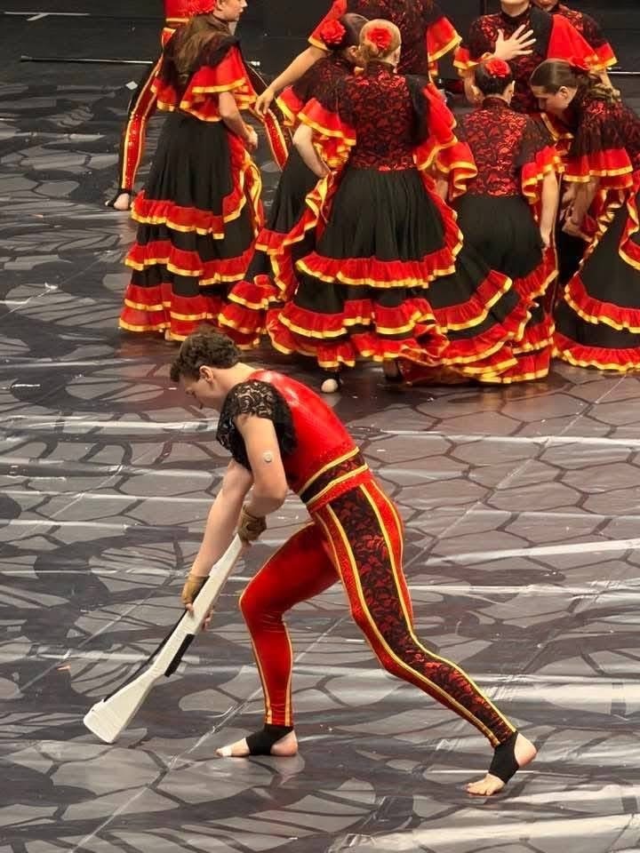 Image of Aidan performing during the show. 