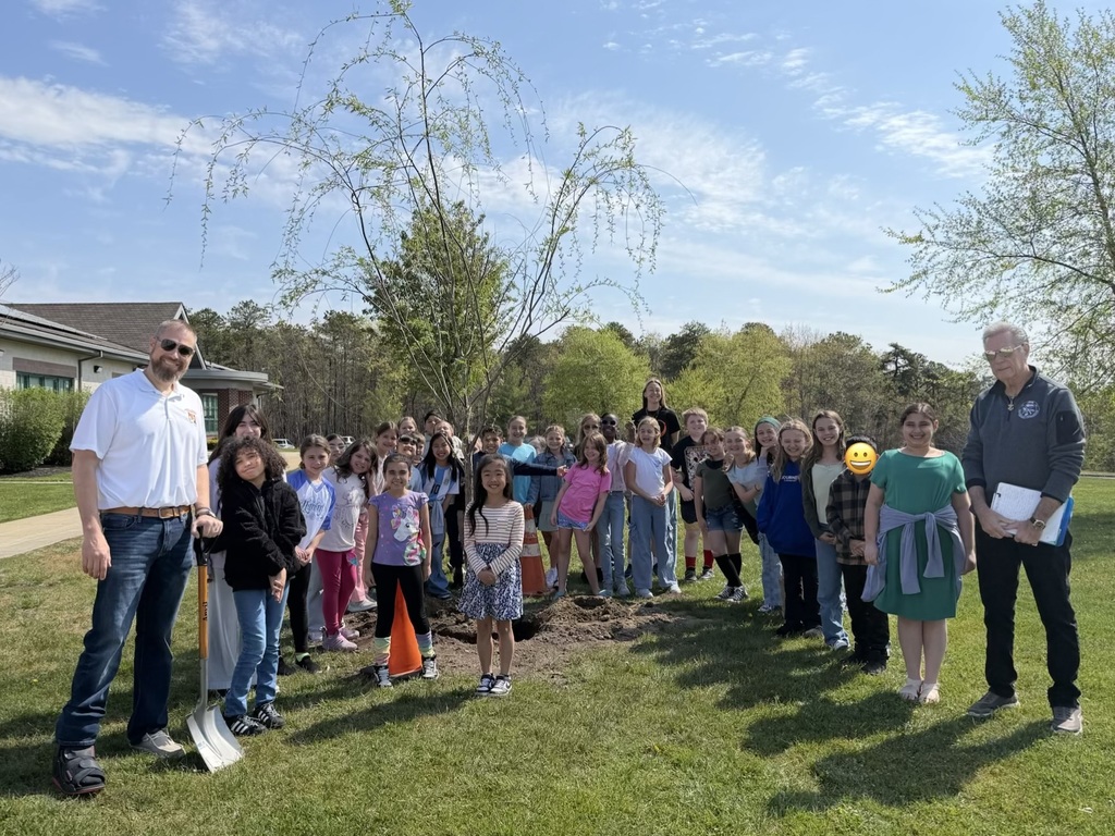 Image of the No Place For Hate students gathered around the tree that they planted with Dr. Latwis, Committeeman Mr. Marte, and school counselor, Ms. Blanchard. 