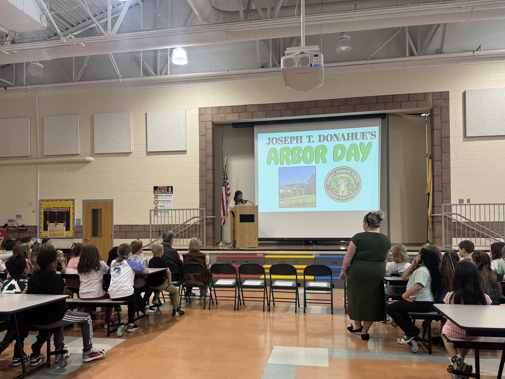 Image of the Mrs. Santolla, Principal, speaking during the JTDS Arbor Day ceremony.  
