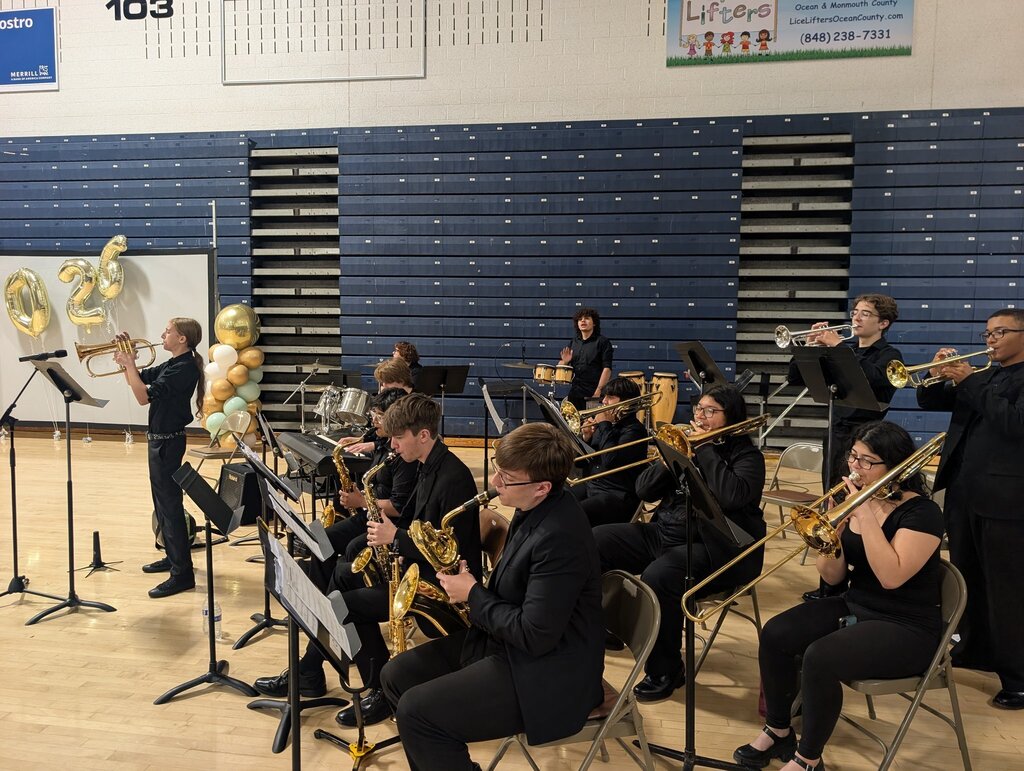 Image of the BHS jazz band performing in the arena. 