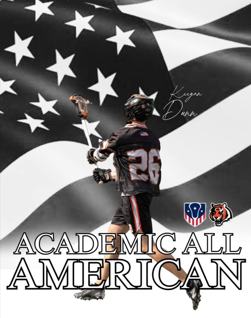 Image of Keegan in uniform with his lacrosse stick in front of a black and white flag that has his name, symbols for BHS and lacrosse, that states Academic All American. 